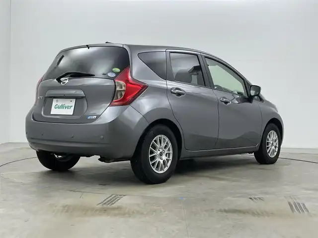 日産 ノート X DIG－S Vセレ +セーフ 岡山県 2015(平27)年 6.8万km ダークメタルグレー 純正7インチナビ/「BT/CD/DVD/フルセグTV/USB」/型番:MC315D-W/アラウンドビューモニター/LEDヘッドライト/オートライト/ＥＴＣ/衝突軽減ブレーキシステム/横滑り防止装置　/社外１４インチアルミ　/コーナーセンサー（前後）/スマートキー×1/プッシュスタート