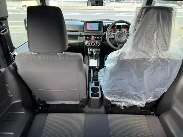 スズキ ジムニー XC 滋賀県 2025(令7)年 0.1万km未満 ミディアムグレー ワンオーナー/イクリプスフルセグナビ/　フルセグ Bluetooth CD DVD SDREC AM FM/バックカメラ/デュアルセンサーブレーキサポート/誤発進抑制機能/車線逸脱警報機能/ふらつき警報機能/ハイビームアシスト/先行車発進お知らせ機能/標識認識機能/エマージェンシーストップシグナル/オートライトシステム/ライト自動消灯システム/ヒーテッドドアミラー/純正LEDヘッドライト/TOYOオープンカントリーR/T/純正16インチアルミ/純正マッドフラップ/純正フロアマット/スマートキー×2/プッシュスタート/保証書/取説/