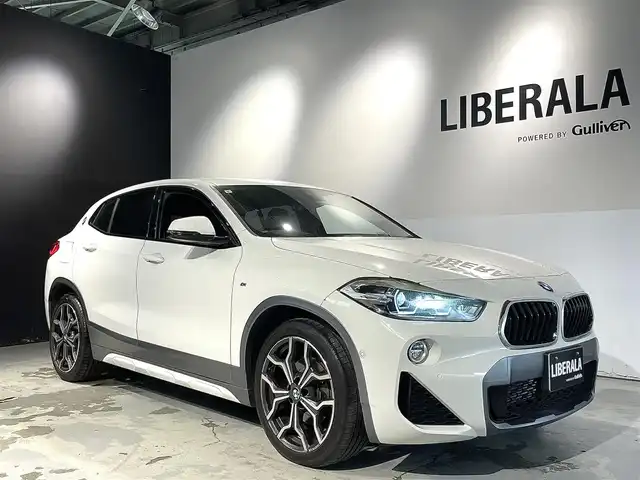 ＢＭＷ Ｘ２ xDrive 18d MスポーツX 道央・札幌 2019(令1)年 1.1万km アルピンホワイトⅢ コンフォートpkg/・オートマチック・テールゲート・オペレーション/・フロント・シート・ヒーティング/電動フロント・シート/（運転席、助手席、運転席メモリー機能付）/M・アロイ・ホイール・Yスポーク・スタイリング722M/（純正１９インチAW）/ドライビング・アシスト/・レーン・ディパーチャー・ウォーニング/・前車接近警告システム/・衝突回避・軽減ブレーキ/ドライビング・アシスト・プラス/・ACC/LEDヘッドライト/オートライト/リヤビューカメラ/ライトpkg/・アンビエントライト/・リーディングライト（フロント・リヤ）/・照明付きバニティミラー（運転席・助手席）/・フットウェル・ライト（フロント・リア）/10.25インチワイド・コントール・ディスプレイ/レインセンサー/ETC/・保証書、取扱説明書（有）/・スペアキー×１