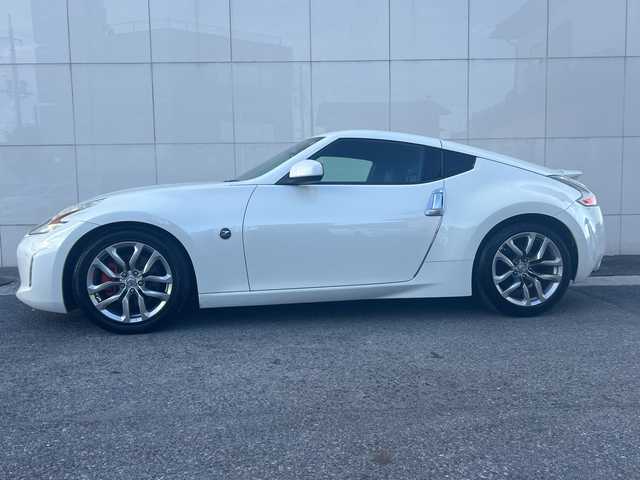 日産 フェアレディ Ｚ バージョンT 埼玉県 2012(平24)年 12.2万km ブリリアントホワイトパール (株)IDOMが運営する【じしゃロン熊谷店】の自社ローン対象車両になります。こちらは現金ご利用時の価格です。自社ローンご希望の方は別途その旨お申付け下さい。/純正HDDナビ/（フルセグTV/BT/CD/DVD/AM/FM)/ETC/バックカメラ/ハーフレザーシート/パワーシート/BOSEサウンドシステム/スマートキー/オートライト/電動格納ミラー/シートヒーター/パドルシフト/マニュアル付きオートマ/純正フロアマット/純正アルミホイール/スマートキー/プッシュスタート