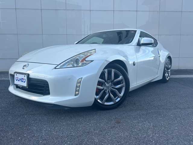 日産 フェアレディ Ｚ バージョンT 埼玉県 2012(平24)年 12.2万km ブリリアントホワイトパール (株)IDOMが運営する【じしゃロン熊谷店】の自社ローン対象車両になります。こちらは現金ご利用時の価格です。自社ローンご希望の方は別途その旨お申付け下さい。/純正HDDナビ/（フルセグTV/BT/CD/DVD/AM/FM)/ETC/バックカメラ/ハーフレザーシート/パワーシート/BOSEサウンドシステム/スマートキー/オートライト/電動格納ミラー/シートヒーター/パドルシフト/マニュアル付きオートマ/純正フロアマット/純正アルミホイール/スマートキー/プッシュスタート