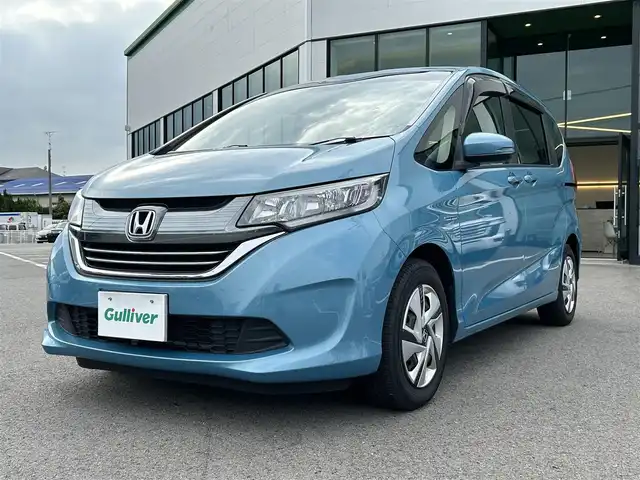 ホンダ フリード ハイブリット B 愛媛県 2018(平30)年 4.5万km ブルーホライゾンM 禁煙車/登録時走行距離：45000km台/社外ナビ/CD/DVD/Bluetooth/バックカメラ/ETC/横滑り防止装置/盗難防止装置/クルーズコントロール/キノセンヘッドライト/両側スライドドア/エンジンスタートボタン/スマートキー/純正フロアマット/純正15インチフルホイールキャップ