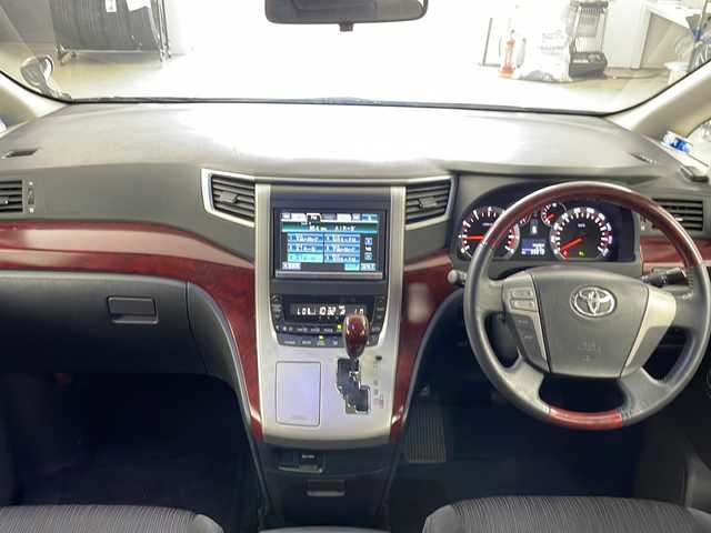 トヨタ ヴェルファイア 2．4Z 道央・札幌 2009(平21)年 10万km ブラック ・４WD/・純正HDDナビ（NHZN-X62G）/CD/DVD/SD/フルセグ/BT/・バックカメラ/・ウィンカーミラー/・オットマン/・ドアバイザー/・プッシュスタート/・スマートキー/・両側パワースライドドア/・HIDヘッドライト/・フォグランプ/・横滑り防止装置/・盗難防止装置