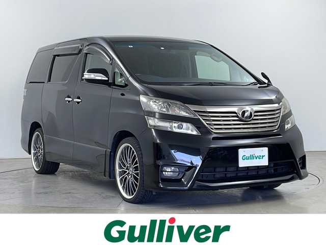 トヨタ ヴェルファイア 2．4Z 道央・札幌 2009(平21)年 10万km ブラック ・４WD/・純正HDDナビ（NHZN-X62G）/CD/DVD/SD/フルセグ/BT/・バックカメラ/・ウィンカーミラー/・オットマン/・ドアバイザー/・プッシュスタート/・スマートキー/・両側パワースライドドア/・HIDヘッドライト/・フォグランプ/・横滑り防止装置/・盗難防止装置