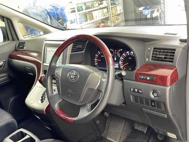トヨタ ヴェルファイア 2．4Z 道央・札幌 2009(平21)年 10万km ブラック ・４WD/・純正HDDナビ（NHZN-X62G）/CD/DVD/SD/フルセグ/BT/・バックカメラ/・ウィンカーミラー/・オットマン/・ドアバイザー/・プッシュスタート/・スマートキー/・両側パワースライドドア/・HIDヘッドライト/・フォグランプ/・横滑り防止装置/・盗難防止装置