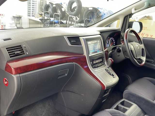 トヨタ ヴェルファイア 2．4Z 道央・札幌 2009(平21)年 10万km ブラック ・４WD/・純正HDDナビ（NHZN-X62G）/CD/DVD/SD/フルセグ/BT/・バックカメラ/・ウィンカーミラー/・オットマン/・ドアバイザー/・プッシュスタート/・スマートキー/・両側パワースライドドア/・HIDヘッドライト/・フォグランプ/・横滑り防止装置/・盗難防止装置