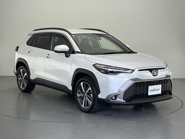 トヨタ カローラ クロス ハイブリッド Z 長野県 2024(令6)年 1.9万km プラチナホワイトパールマイカ 4WD/ワンオーナー/純正ディスプレイオーディオ/(フルセグTV＆ナビ機能＆BL＆AppleCarPlay＆AndroidoAuto＆FM・AM）/パノラミックビューモニター/ナビ内臓ドラレコ（前後）/トヨタセーフティセンス/・レーダークルーズコントロール/・ブラインドスポットモニター/・PCS（プリクラッシュセーフティ）/・LDA（レーンディパーチャーアラート）/・PDA（プロアクティブドライビングアシスト）/・RCTA（リヤクロストラフィックアラート）/・RCD（リヤカメラディテクション）/・PKSB（パーキングサポートブレーキ）/・SEA（安心降車アシスト）/・RSA (ロードサインアシスト)/・クリアランスソナー/寒冷地仕様/100V充電/パワーバックドア/前席シートヒーター/ビルトインETC2.0/置くだけ充電/電動ブレーキホールド/オートホールド/ステアリングヒーター/ステアリングスイッチ/パワーシート（D席）/LEDヘッドライト/フロント/リアフォグランプ/オートマチックハイビーム/18インチ純正アルミホイール/純正フロアマット/ドアバイザー/スマートキー/スペアーキー/車両取扱説明書/新車時保証書