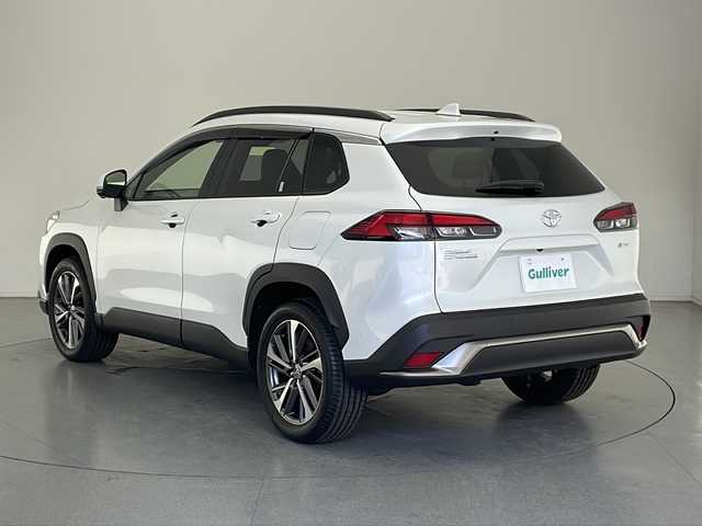 トヨタ カローラ クロス ハイブリッド Z 長野県 2024(令6)年 1.9万km プラチナホワイトパールマイカ 4WD/ワンオーナー/純正ディスプレイオーディオ/(フルセグTV＆ナビ機能＆BL＆AppleCarPlay＆AndroidoAuto＆FM・AM）/パノラミックビューモニター/ナビ内臓ドラレコ（前後）/トヨタセーフティセンス/・レーダークルーズコントロール/・ブラインドスポットモニター/・PCS（プリクラッシュセーフティ）/・LDA（レーンディパーチャーアラート）/・PDA（プロアクティブドライビングアシスト）/・RCTA（リヤクロストラフィックアラート）/・RCD（リヤカメラディテクション）/・PKSB（パーキングサポートブレーキ）/・SEA（安心降車アシスト）/・RSA (ロードサインアシスト)/・クリアランスソナー/寒冷地仕様/100V充電/パワーバックドア/前席シートヒーター/ビルトインETC2.0/置くだけ充電/電動ブレーキホールド/オートホールド/ステアリングヒーター/ステアリングスイッチ/パワーシート（D席）/LEDヘッドライト/フロント/リアフォグランプ/オートマチックハイビーム/18インチ純正アルミホイール/純正フロアマット/ドアバイザー/スマートキー/スペアーキー/車両取扱説明書/新車時保証書