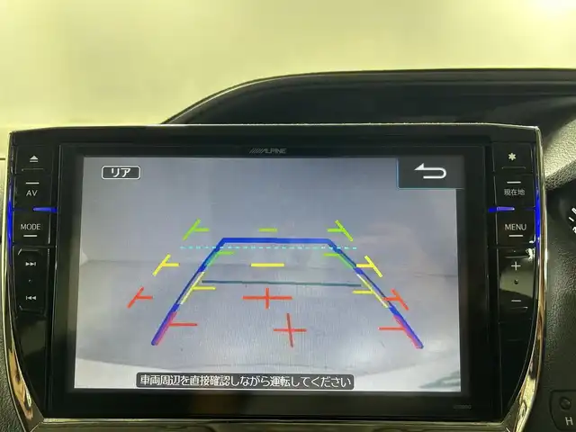 トヨタ ヴォクシー ZS 佐賀県 2014(平26)年 12万km ホワイトパールクリスタルシャイン 社外１０インチナビ/CD/DVD/フルセグTV/Bluetooth/HDMI/社外11.４インチフリップダウンモニター/両側パワースライドドア/前後ドライブレコーダー/ビルトインETC/フロアマット/ドアバイザー/サンシェード/電動格納ミラー/オートライト/LEDヘッドライト/純正１６インチアルミホイール