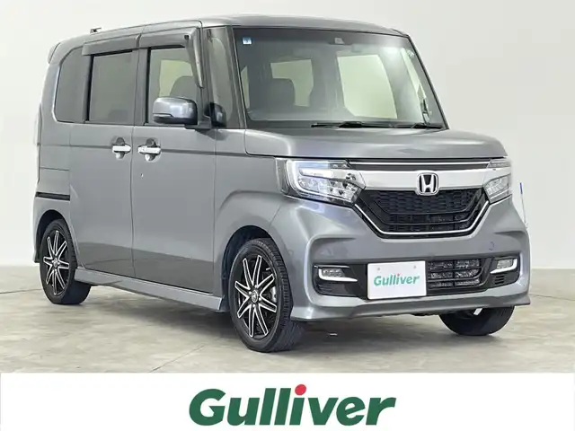 ホンダ Ｎ ＢＯＸ カスタム G L ターボ ホンダセンシング 千葉県 2019(平31)年 3.6万km シャイニンググレーM HondaSENSING/・衝突軽減ブレーキ〈CMBS〉/・誤発進抑制機能/・後方誤発進抑制機能/・歩行者事故低減ステアリング/・路外逸脱抑制機能/・ACC〈アダプティブ・クルーズ・コントロール〉/・LKAS〈車線維持支援システム〉/・オートハイビーム/・先行車発進お知らせ機能/・標識認識機能/純正7インチナビ/・Bluetooth/・フルセグTV/・CD/DVD再生可能/・バックカメラ/ハーフレザーシート/両側パワースライドドア/スマートキー/ビルトインETC/LEDヘッドライト/サイド/カーテンエアバッグ