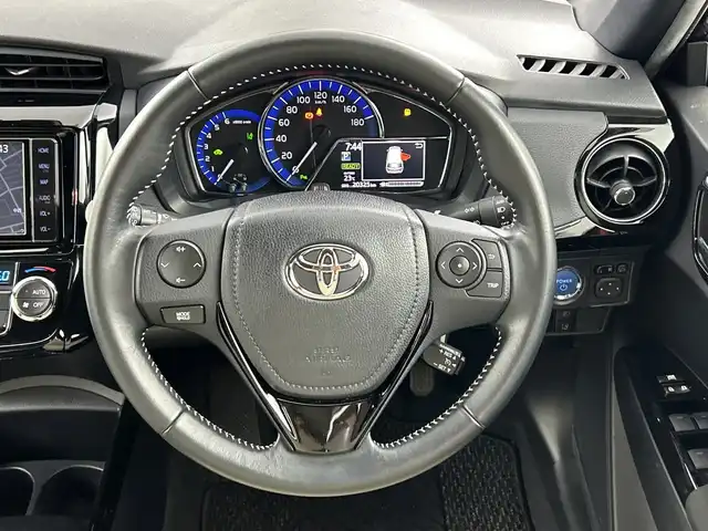 トヨタ カローラ フィールダー ハイブリッドG ダブルバイビー 愛知県 2019(平31)年 2.1万km ブラッキッシュアゲハガラスフレーク ホワイトインテリア/・ホワイト合皮シート/・ホワイト専用インパネ加飾/・ホワイト専用アームレスト/前席シートヒーター/純正7インチナビ/（ＤＶＤ/ＣＤ/フルセグ/Bluetooth/ＦＭ/ＡＭ）/セーフティセンス/・プリクラッシュセーフティ/・レーンディパーチャーアラート/・オートマチックハイビーム/バックカメラ/純正16インチアルミホイール/スマートキー/プッシュスタート/ＬＥＤライト/ナノイー/純正１６インチＡＷ/クルーズコントロール/純正フロアマット/ＥＴＣ