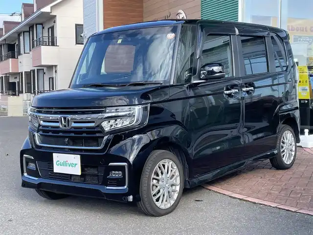 ホンダ Ｎ ＢＯＸ カスタム L ターボ 道央・札幌 2023(令5)年 1.2万km クリスタルブラックパール 登録時走行距離12/001km/ワンオーナー/　４　W　D　/寒冷地仕様/ターボ/ホンダセンシング/　・レーンキープアシスト/　・衝突軽減ブレーキ/　・誤発進抑制機能/　・後方誤発進抑制機能/　・歩行者事故軽減ステアリング/　・先行車発進お知らせ機能/　・オートハイビーム/純正ナビ（CD/DVD/FM/AM/SD/BT)/フルセグ（走行中視聴可能）/バックカメラ/フロントカメラ/ウィンカーミラー/クルーズコントロール（追従走行あり）/アイドリングストップ/ドアバイザー/プッシュスタート/両側パワースライドドア/ETC/ドライブレコーダー/スペアキー×１/純正エンジンスターター/ベンチシート/純正フロアマット/シートヒーター（運転席/助手席）/横滑り防止装置/盗難防止装置/フォグランプ/ステアリングスイッチ/革巻きステアリング/イルミネーションコントロール/ECONスイッチ/ワイパー間欠時間コントローラー/パドルシフト/MTモード付AT/ミラーヒーター/プラズマクラスター搭載エアコン/ヘッドライトレベライザー/シートバックテーブル