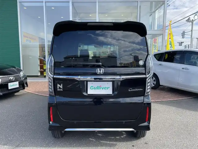ホンダ Ｎ ＢＯＸ カスタム L ターボ 道央・札幌 2023(令5)年 1.2万km クリスタルブラックパール 登録時走行距離12/001km/ワンオーナー/　４　W　D　/寒冷地仕様/ターボ/ホンダセンシング/　・レーンキープアシスト/　・衝突軽減ブレーキ/　・誤発進抑制機能/　・後方誤発進抑制機能/　・歩行者事故軽減ステアリング/　・先行車発進お知らせ機能/　・オートハイビーム/純正ナビ（CD/DVD/FM/AM/SD/BT)/フルセグ（走行中視聴可能）/バックカメラ/フロントカメラ/ウィンカーミラー/クルーズコントロール（追従走行あり）/アイドリングストップ/ドアバイザー/プッシュスタート/両側パワースライドドア/ETC/ドライブレコーダー/スペアキー×１/純正エンジンスターター/ベンチシート/純正フロアマット/シートヒーター（運転席/助手席）/横滑り防止装置/盗難防止装置/フォグランプ/ステアリングスイッチ/革巻きステアリング/イルミネーションコントロール/ECONスイッチ/ワイパー間欠時間コントローラー/パドルシフト/MTモード付AT/ミラーヒーター/プラズマクラスター搭載エアコン/ヘッドライトレベライザー/シートバックテーブル