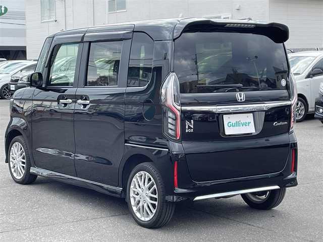 ホンダ Ｎ ＢＯＸ カスタム L ターボ 道央・札幌 2023(令5)年 1.2万km クリスタルブラックパール 登録時走行距離12001km/ワンオーナー/　４　W　D　/寒冷地仕様/ターボ/ホンダセンシング/　・レーンキープアシスト/　・衝突軽減ブレーキ/　・誤発進抑制機能/　・後方誤発進抑制機能/　・歩行者事故軽減ステアリング/　・先行車発進お知らせ機能/　・オートハイビーム/純正ナビ（CD/DVD/FM/AM/SD/BT)/フルセグ（走行中視聴可能）/バックカメラ/フロントカメラ/ウィンカーミラー/クルーズコントロール（追従走行あり）/アイドリングストップ/ドアバイザー/プッシュスタート/両側パワースライドドア/ETC/ドライブレコーダー/スペアキー×１/純正エンジンスターター/ベンチシート/純正フロアマット/シートヒーター（運転席/助手席）/横滑り防止装置/盗難防止装置/フォグランプ/ステアリングスイッチ/革巻きステアリング/イルミネーションコントロール/ECONスイッチ/ワイパー間欠時間コントローラー/パドルシフト/MTモード付AT/ミラーヒーター/プラズマクラスター搭載エアコン/ヘッドライトレベライザー/シートバックテーブル