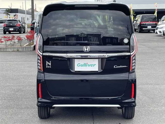 ホンダ Ｎ ＢＯＸ カスタム L ターボ 道央・札幌 2023(令5)年 1.2万km クリスタルブラックパール 登録時走行距離12001km/ワンオーナー/　４　W　D　/寒冷地仕様/ターボ/ホンダセンシング/　・レーンキープアシスト/　・衝突軽減ブレーキ/　・誤発進抑制機能/　・後方誤発進抑制機能/　・歩行者事故軽減ステアリング/　・先行車発進お知らせ機能/　・オートハイビーム/純正ナビ（CD/DVD/FM/AM/SD/BT)/フルセグ（走行中視聴可能）/バックカメラ/フロントカメラ/ウィンカーミラー/クルーズコントロール（追従走行あり）/アイドリングストップ/ドアバイザー/プッシュスタート/両側パワースライドドア/ETC/ドライブレコーダー/スペアキー×１/純正エンジンスターター/ベンチシート/純正フロアマット/シートヒーター（運転席/助手席）/横滑り防止装置/盗難防止装置/フォグランプ/ステアリングスイッチ/革巻きステアリング/イルミネーションコントロール/ECONスイッチ/ワイパー間欠時間コントローラー/パドルシフト/MTモード付AT/ミラーヒーター/プラズマクラスター搭載エアコン/ヘッドライトレベライザー/シートバックテーブル