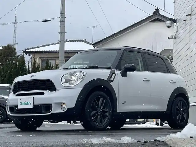 ＭＩＮＩ ミニ クロスオーバー クーパー S オール4 山形県 2014(平26)年 5.5万km ライトホワイト 禁煙車/4WD/ミントパッケージ/バイキセノンヘッドライト、レインセンサー/ジンジャーパッケージ/スポーツボタン、ヘッドライナー/アンスラサイト/純正オーディオ/・AM/FM/CD/横滑り防止装置/盗難防止装置/電動格納ミラー/プッシュスタート/スマートキー/MTモード付AT/フロントフォグランプ/フロアマット/ETC