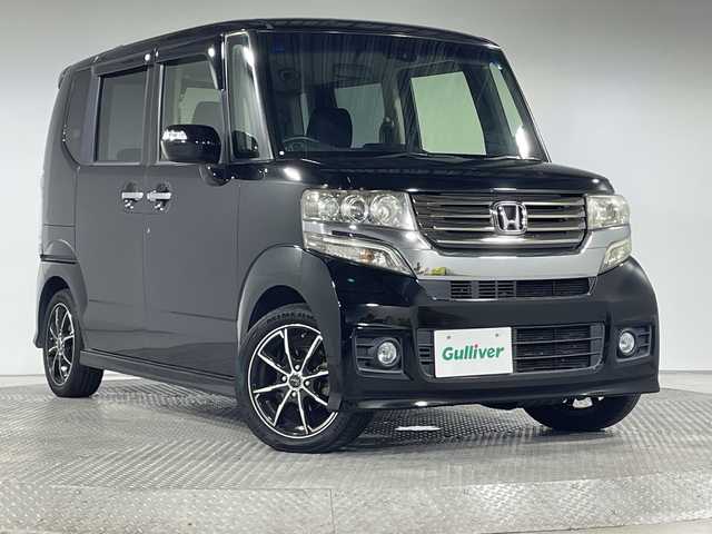 ホンダ Ｎ ＢＯＸ カスタム G ターボSSパッケージ 神奈川県 2014(平26)年 6.3万km スマートブラック シティブレーキアクティブシステム/純正7型メモリナビ/（CD/DVD/USB/iPod/BT/ワンセグTV/AUX）/バックカメラ/アイドリングストップ/クルーズコントロール/純正ETC/プッシュスタート/両側パワースライドドア/パドルシフト/革巻きステアリング/ステアリングスイッチ/ベンチシート/チップアップシート/オートライト/電動格納ミラー/純正フロアマット/15型AW/スマートキー