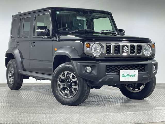 スズキ ジムニー ノマド FC 神奈川県 2025(令7)年 0.1千km 黒 登録済未使用車/4WD/セーフティサポート/デュアルカメラブレーキサポート/誤発進抑制機能/後退時ブレーキサポート/後方誤発進抑制機能/車線逸脱警報機能/ハイビームアシスト/アダブティブクルーズコントロール/標識認識機能/ふらつき警報/先行車発進お知らせ機能/アイドリングストップ/リアソナー/前席シートヒーター/ステアリングスイッチ/革巻きステアリング/ダウンヒルアシストコントロール/プッシュスタート/スマートキー/純正15インチアルミホイール/LEDヘッドランプ/LEDフロントフォグ/オートライト/リアフォグランプ/ヘッドライトウォッシャー/背面タイヤ/取説/保証書/スペアキー