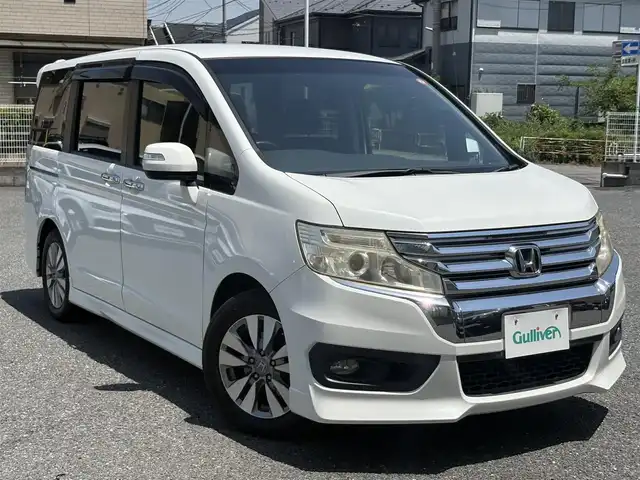 ホンダ ステップワゴン スパーダ Z 埼玉県 2014(平26)年 9.1万km ホワイトオーキッドパール ・ディーラー点検記録複数年有/・ワンオーナー　/コンフォートビューパッケージ/［親水/ヒーテッドドアミラー+フロントドア撥水ガラス］/・ナビ装着用スペシャルパッケージ/・純正9インチプレミアムインターナビTV　DVD BT　/・バックカメラ　/・ＥＴＣ　/・両側パワースライドドア　/・リア両側イージードアクローザー/・オートライト　/ディスチャージヘッドライト＜HID＞/（ロービーム、オートレベリング/オートライトコントロール機構付）　/・アクティブコーナリングライト/・フォグライト　　/・クルーズコントロール　/・パドルシフト/・Hondaスマートキーシステム（Hondaスマートキー2個付）/・１６インチアルミホイール＋スチールラジアルタイヤ（205/60R16 92H　ＢＳレグノサマータイヤ）/・クルーズコントロール/・スーパーＵＶカットフロントドアガラス/・保証書/・取説