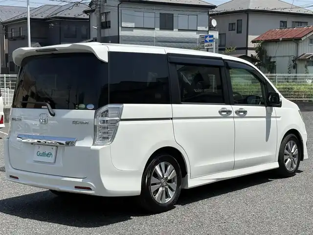 ホンダ ステップワゴン スパーダ Z 埼玉県 2014(平26)年 9.1万km ホワイトオーキッドパール ・ディーラー点検記録複数年有/・ワンオーナー　/コンフォートビューパッケージ/［親水/ヒーテッドドアミラー+フロントドア撥水ガラス］/・ナビ装着用スペシャルパッケージ/・純正9インチプレミアムインターナビTV　DVD BT　/・バックカメラ　/・ＥＴＣ　/・両側パワースライドドア　/・リア両側イージードアクローザー/・オートライト　/ディスチャージヘッドライト＜HID＞/（ロービーム、オートレベリング/オートライトコントロール機構付）　/・アクティブコーナリングライト/・フォグライト　　/・クルーズコントロール　/・パドルシフト/・Hondaスマートキーシステム（Hondaスマートキー2個付）/・１６インチアルミホイール＋スチールラジアルタイヤ（205/60R16 92H　ＢＳレグノサマータイヤ）/・クルーズコントロール/・スーパーＵＶカットフロントドアガラス/・保証書/・取説