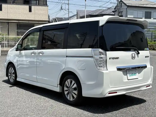 ホンダ ステップワゴン スパーダ Z 埼玉県 2014(平26)年 9.1万km ホワイトオーキッドパール ・ディーラー点検記録複数年有/・ワンオーナー　/コンフォートビューパッケージ/［親水/ヒーテッドドアミラー+フロントドア撥水ガラス］/・ナビ装着用スペシャルパッケージ/・純正9インチプレミアムインターナビTV　DVD BT　/・バックカメラ　/・ＥＴＣ　/・両側パワースライドドア　/・リア両側イージードアクローザー/・オートライト　/ディスチャージヘッドライト＜HID＞/（ロービーム、オートレベリング/オートライトコントロール機構付）　/・アクティブコーナリングライト/・フォグライト　　/・クルーズコントロール　/・パドルシフト/・Hondaスマートキーシステム（Hondaスマートキー2個付）/・１６インチアルミホイール＋スチールラジアルタイヤ（205/60R16 92H　ＢＳレグノサマータイヤ）/・クルーズコントロール/・スーパーＵＶカットフロントドアガラス/・保証書/・取説