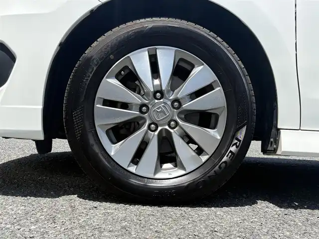 ホンダ ステップワゴン スパーダ Z 埼玉県 2014(平26)年 9.1万km ホワイトオーキッドパール ・ディーラー点検記録複数年有/・ワンオーナー　/コンフォートビューパッケージ/［親水/ヒーテッドドアミラー+フロントドア撥水ガラス］/・ナビ装着用スペシャルパッケージ/・純正9インチプレミアムインターナビTV　DVD BT　/・バックカメラ　/・ＥＴＣ　/・両側パワースライドドア　/・リア両側イージードアクローザー/・オートライト　/ディスチャージヘッドライト＜HID＞/（ロービーム、オートレベリング/オートライトコントロール機構付）　/・アクティブコーナリングライト/・フォグライト　　/・クルーズコントロール　/・パドルシフト/・Hondaスマートキーシステム（Hondaスマートキー2個付）/・１６インチアルミホイール＋スチールラジアルタイヤ（205/60R16 92H　ＢＳレグノサマータイヤ）/・クルーズコントロール/・スーパーＵＶカットフロントドアガラス/・保証書/・取説
