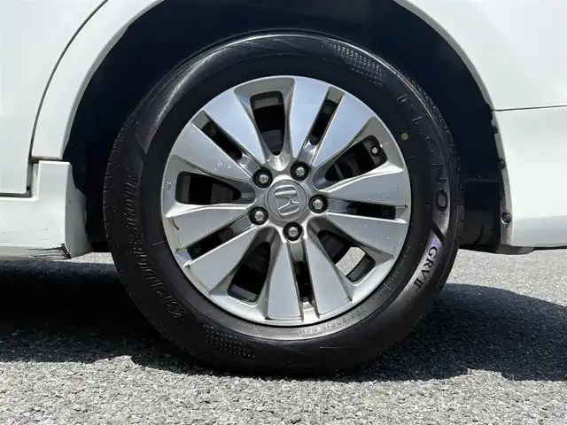 ホンダ ステップワゴン スパーダ Z 埼玉県 2014(平26)年 9.1万km ホワイトオーキッドパール ・ディーラー点検記録複数年有/・ワンオーナー　/コンフォートビューパッケージ/［親水/ヒーテッドドアミラー+フロントドア撥水ガラス］/・ナビ装着用スペシャルパッケージ/・純正9インチプレミアムインターナビTV　DVD BT　/・バックカメラ　/・ＥＴＣ　/・両側パワースライドドア　/・リア両側イージードアクローザー/・オートライト　/ディスチャージヘッドライト＜HID＞/（ロービーム、オートレベリング/オートライトコントロール機構付）　/・アクティブコーナリングライト/・フォグライト　　/・クルーズコントロール　/・パドルシフト/・Hondaスマートキーシステム（Hondaスマートキー2個付）/・１６インチアルミホイール＋スチールラジアルタイヤ（205/60R16 92H　ＢＳレグノサマータイヤ）/・クルーズコントロール/・スーパーＵＶカットフロントドアガラス/・保証書/・取説