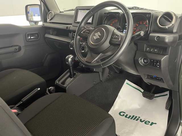 スズキ ジムニー XC 宮崎県 2018(平30)年 4.6万km ジャングルグリーン 禁煙車/パートタイム4WD/衝突被害軽減ブレーキ/社外ナビTV/（MDV-D406BT/CD/Bluetooth/FMAM/ワンセグTV)/社外バックカメラ/社外ETC/純正マッドガード/純正LEDオートライト/純正フォグ/純正16インチアルミ/純正セキュリティアラーム/クルーズコントロール/レーンディパーチャーアラート/ダウンヒルアシストコントロール/シートヒーター/オートエアコン/ウインカードアミラー/本革巻ハンドル/スマートキー/プッシュエンジンスタート/新車時保証書/取扱い説明書
