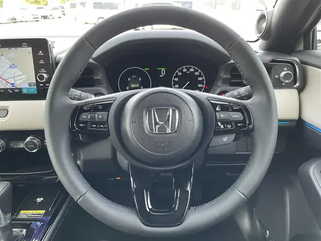ホンダ ヴェゼル ハイブリッド e:HEV Z PLaYパッケージ 群馬県 2025(令7)年 0.1千km パールⅡ パノラマルーフ/ワンオーナー/純正9インチワイドナビ/（Bluetooth/AppleCarPlay/AndroidAuto）/フルセグテレビ/マルチビューカメラシステム/プレミアムオーディオ/ホンダセンシング/・衝突軽減ブレーキ/・誤発進抑制機能/・後方誤発進抑制機能/・近距離衝突軽減ブレーキ/・歩行者事故軽減ステアリング/・路外逸脱抑制機能/・渋滞追従機能付アダプティブクルーズコントロール/・車線維持支援システム/・先行車発進お知らせ機能/・標識認識機能/・オートハイビーム/・パーキングセンサーシステム/・トラフィックジャムアシスト/・アダプティブドライビングビーム/・ブラインドスポットインフォメーション/・後退出庫サポート/置くだけ充電/LEDヘッドライト