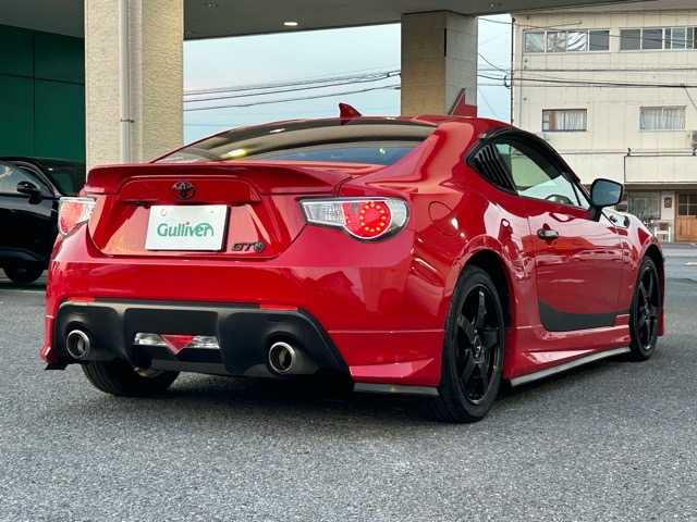 トヨタ ８６ GT 茨城県 2014(平26)年 15.9万km ライトニングレッド 純正ディーラーナビ/バックカメラ/ETC/フルセグTV/Bluetooth/CD/USB/ドライブレコーダー/社外フロアマット/モデリスタエアロ/社外アルミホイール/ドアバイザー/オートライト