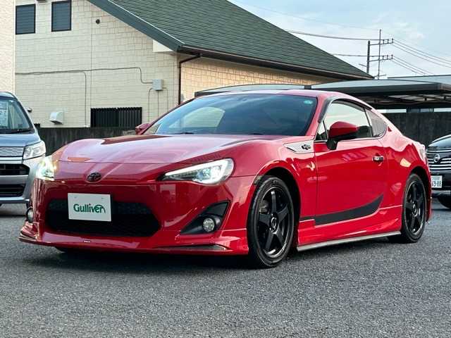 トヨタ ８６ GT 茨城県 2014(平26)年 15.9万km ライトニングレッド 純正ディーラーナビ/バックカメラ/ETC/フルセグTV/Bluetooth/CD/USB/ドライブレコーダー/社外フロアマット/モデリスタエアロ/社外アルミホイール/ドアバイザー/オートライト