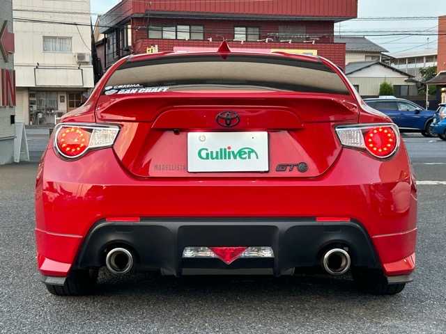 トヨタ ８６ GT 茨城県 2014(平26)年 15.9万km ライトニングレッド 純正ディーラーナビ/バックカメラ/ETC/フルセグTV/Bluetooth/CD/USB/ドライブレコーダー/社外フロアマット/モデリスタエアロ/社外アルミホイール/ドアバイザー/オートライト
