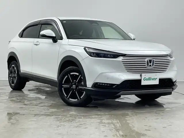ホンダ ヴェゼル ハイブリッド e:HEV X 新潟県 2022(令4)年 5.6万km プラチナホワイトパール ホンダコネクトナビ（Bluetooth・USB）/バックカメラ　/純正エアロ（フロント・サイド・リア）　/ETC2.0　/フルセグ　/レーンキープアシスト　/追従クルーズコントロール　/前後コーナーセンサー　/ダウンヒルアシストコントロール/アイドリングストップ/衝突被害軽減システム　/前席シートヒーター　/電動格納サードシート/LEDオートライト/オートマチックハイビーム/純正前後ドライブレコーダー/寒冷地仕様/４WD/純正フロアマット/純正１８インチアルミホイール/ワイヤレス充電/ヒーテッドドアミラー/ワイパーデアイサー/パドルシフト/ブレーキホールド/レザーステアリング/スポーツモード/エコモード/スマートキー/スペアキー
