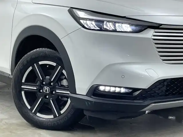 ホンダ ヴェゼル ハイブリッド e:HEV X 新潟県 2022(令4)年 5.6万km プラチナホワイトパール ホンダコネクトナビ（Bluetooth・USB）/バックカメラ　/純正エアロ（フロント・サイド・リア）　/ETC2.0　/フルセグ　/レーンキープアシスト　/追従クルーズコントロール　/前後コーナーセンサー　/ダウンヒルアシストコントロール/アイドリングストップ/衝突被害軽減システム　/前席シートヒーター　/電動格納サードシート/LEDオートライト/オートマチックハイビーム/純正前後ドライブレコーダー/寒冷地仕様/４WD/純正フロアマット/純正１８インチアルミホイール/ワイヤレス充電/ヒーテッドドアミラー/ワイパーデアイサー/パドルシフト/ブレーキホールド/レザーステアリング/スポーツモード/エコモード/スマートキー/スペアキー