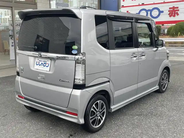 ホンダ Ｎ ＢＯＸ カスタム G SSパッケージ 愛知県 2014(平26)年 5.3万km アラバスターシルバーメタリック (株)IDOMが運営する【じしゃロン豊川店】の自社ローン対象車両になります。こちらは現金ご利用時の価格です。自社ローンご希望の方は別途その旨お申付け下さい。/ 純正Gathersナビ/　〇 CD再生機能/ バックカメラ/ ETC/ 革巻ステアリング/ ステアリングスイッチ/ 両側パワースライドドア/ ドアバイザー/ ウインカーミラー/ 純正フロアマット