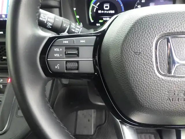 ホンダ ステップワゴン スパーダ eHEV 千葉県 2023(令5)年 3.9万km プラチナホワイトパール 205/60R16/ホンダセンシング/・衝突軽減ブレーキ（CMBS）/・車線維持支援システム（LKAS）/・アダプティブクルーズコントロール（ACC）/・後方誤発進抑制機能/・誤発進抑制機能/パワーバックドア/両側パワースライドドア/純正ナビ/地デジTV/【DVD/CD再生機能　Bluetooth接続】/バックカメラ/ハーフレザーシート/前席シートヒーター/革巻きステアリング/ステアリングスイッチ/パドルシフト/ETC/LEDヘッドライト/フォグライト/ウインカーミラー/コーナーセンサー/純正16インチアルミホイル/サイド/カーテンエアバッグ/Honda スマートキー