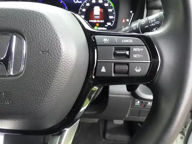 ホンダ ステップワゴン スパーダ eHEV 千葉県 2023(令5)年 3.9万km プラチナホワイトパール 205/60R16/ホンダセンシング/・衝突軽減ブレーキ（CMBS）/・車線維持支援システム（LKAS）/・アダプティブクルーズコントロール（ACC）/・後方誤発進抑制機能/・誤発進抑制機能/パワーバックドア/両側パワースライドドア/純正ナビ/地デジTV/【DVD/CD再生機能　Bluetooth接続】/バックカメラ/ハーフレザーシート/前席シートヒーター/革巻きステアリング/ステアリングスイッチ/パドルシフト/ETC/LEDヘッドライト/フォグライト/ウインカーミラー/コーナーセンサー/純正16インチアルミホイル/サイド/カーテンエアバッグ/Honda スマートキー