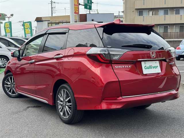ホンダ シャトル ハイブリッド Z ホンダセンシング 千葉県 2019(令1)年 2.4万km プレミアムクリスタルレッドM ワンオーナー/ホンダセンシング/衝突被害軽減ブレーキ/車線維持支援システム/アダプティブクルーズコントロール/純正メモリーナビ/フルセグTV/Bluetooth/バックカメラ/CD・DVD再生機能/ビルトインETC/ドライブレコーダー/ハーフレザーシート/D+N席シートヒーター/LEDライト/ETC/カーテンエアバッグ/パドルシフト/純正フロアマット/純正16インチアルミホイール/純正ドアバイザー/プッシュスタート/スマートキー/取扱説明書＆保証書