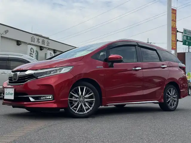 ホンダ シャトル ハイブリッド Z ホンダセンシング 千葉県 2019(令1)年 2.4万km プレミアムクリスタルレッドM ワンオーナー/ホンダセンシング/衝突被害軽減ブレーキ/車線維持支援システム/アダプティブクルーズコントロール/純正メモリーナビ/フルセグTV/Bluetooth/バックカメラ/CD・DVD再生機能/ビルトインETC/ドライブレコーダー/ハーフレザーシート/D+N席シートヒーター/LEDライト/ETC/カーテンエアバッグ/パドルシフト/純正フロアマット/純正16インチアルミホイール/純正ドアバイザー/プッシュスタート/スマートキー/取扱説明書＆保証書