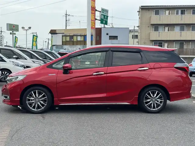ホンダ シャトル ハイブリッド Z ホンダセンシング 千葉県 2019(令1)年 2.4万km プレミアムクリスタルレッドM ワンオーナー/ホンダセンシング/衝突被害軽減ブレーキ/車線維持支援システム/アダプティブクルーズコントロール/純正メモリーナビ/フルセグTV/Bluetooth/バックカメラ/CD・DVD再生機能/ビルトインETC/ドライブレコーダー/ハーフレザーシート/D+N席シートヒーター/LEDライト/ETC/カーテンエアバッグ/パドルシフト/純正フロアマット/純正16インチアルミホイール/純正ドアバイザー/プッシュスタート/スマートキー/取扱説明書＆保証書