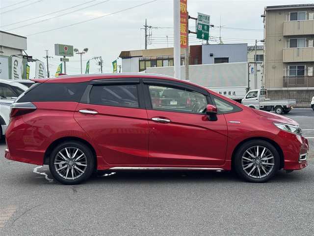 ホンダ シャトル ハイブリッド Z ホンダセンシング 千葉県 2019(令1)年 2.4万km プレミアムクリスタルレッドM ワンオーナー/ホンダセンシング/衝突被害軽減ブレーキ/車線維持支援システム/アダプティブクルーズコントロール/純正メモリーナビ/フルセグTV/Bluetooth/バックカメラ/CD・DVD再生機能/ビルトインETC/ドライブレコーダー/ハーフレザーシート/D+N席シートヒーター/LEDライト/ETC/カーテンエアバッグ/パドルシフト/純正フロアマット/純正16インチアルミホイール/純正ドアバイザー/プッシュスタート/スマートキー/取扱説明書＆保証書