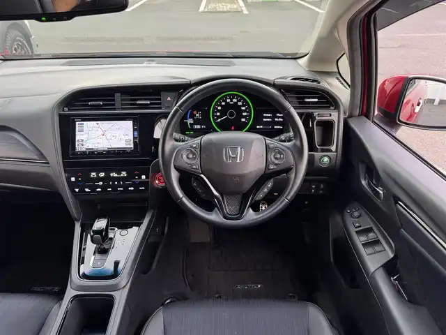 ホンダ シャトル ハイブリッド Z ホンダセンシング 千葉県 2019(令1)年 2.4万km プレミアムクリスタルレッドM ワンオーナー/ホンダセンシング/衝突被害軽減ブレーキ/車線維持支援システム/アダプティブクルーズコントロール/純正メモリーナビ/フルセグTV/Bluetooth/バックカメラ/CD・DVD再生機能/ビルトインETC/ドライブレコーダー/ハーフレザーシート/D+N席シートヒーター/LEDライト/ETC/カーテンエアバッグ/パドルシフト/純正フロアマット/純正16インチアルミホイール/純正ドアバイザー/プッシュスタート/スマートキー/取扱説明書＆保証書
