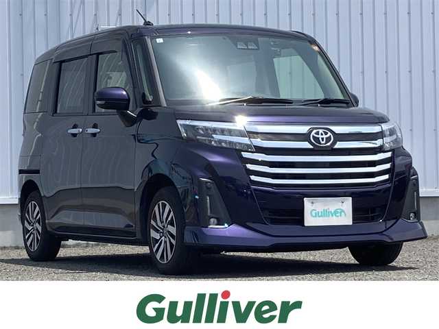 トヨタ ルーミー カスタムG 熊本県 2023(令5)年 2.1万km クールバイオレットクリスタルシャイン 純正ナビ/・AM/FM/CD/DVD/BT/SD/・フルセグＴＶ/・バックカメラ/・テレビキャンセラー/スマートアシスト/・衝突警報機能/・先行車発進お知らせ/・標識認識機能/・車線逸脱警報機能/・ふらつき警報/・アダプティブクルーズコントロール/・オートハイビーム/前席シートヒーター/前後ドライブレコーダー/電動パーキングブレーキ/・オートホールド/横滑り防止装置/革巻きステアリング/・ステアリングスイッチ/オートライト/LEDヘッドライト/・フォグランプ/アイドリングストップ/ビルトインETC/電動格納ミラー/・ウインカーミラー/純正ドアバイザー/純正フロアマット/プッシュスタート/・スペアキー