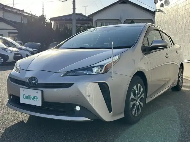 トヨタ プリウス A 山形県 2019(平31)年 1.9万km スティールブロンドM 純正SDナビ/フルセグTV/FM/AM/Bluetooth/レーダークルーズコントロール/横滑り防止装置/バックカメラ/パワーシート（D）/インテリジェントクリアランスソナー/衝突軽減ブレーキ/ヘッドアップディスプレイ/パーキングアシスト/純正マット/純正バイザー/スペアキー/ETC/アルミ付きスタッドレス車載/保証書/取扱説明書