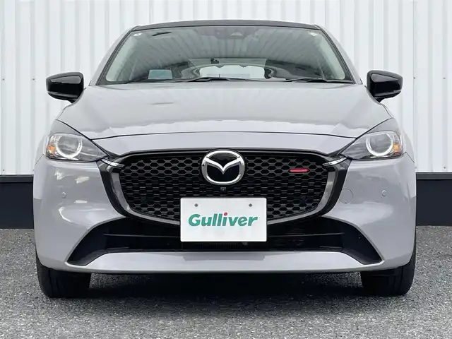 マツダ マツダ２ 15スポルト 千葉県 2024(令6)年 1.9万km グレー 純正8インチナビ/(フルセグTV/BT/FM/AM)/全周囲カメラ/前後ドライブレコーダー/ヘッドアップディスプレイ/パドルシフト/衝突被害軽減システム/車線逸脱警報/レーダークルーズコントロール/ハーフレザーシート/シートヒーター/シートリフター/ステアリングヒーター/横滑り防止装置/ETC/アイドリングストップ/LEDヘッドライト/オートライト/ウィンカーミラー/電動格納ミラー/純正16インチAW/プッシュスタート/スマートキー/フロアマット/スペアキー/取扱説明書/保証書
