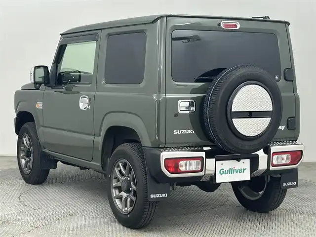 スズキ ジムニー XC 道央・札幌 2019(令1)年 0.7万km ジャングルグリーン ・４WD/・社外メモリーナビ/　CD/DVD/SD/BT/フルセグ/・バックカメラ/・ビルトインETC/・衝突軽減ブレーキ/・クルーズコントロール/・レーンキープアシスト/・前席シートヒーター/・ヘッドライトウォッシャー/・ステアリングスイッチ/・メッキグリル/・メッキテールカバー/・純正マッドフラップ/・LEDヘッドライト/・フォグライト/・オートライト/・純正フロアマット/・ドアバイザー