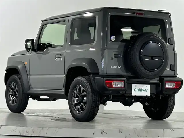 スズキ ジムニー シエラ JC 佐賀県 2025(令7)年 0.1万km ミディアムグレー 社外7インチナビ /Bluetooth/CD/SD/FM.AM/スズキレーダーブレーキサポートシステム/コーナーセンサー/クルーズコントロール/パートタイム4WD/アイドリングストップ/ダウンヒルアシストコントロール/運転席/助手席シートヒーター/社外フロアマット/純正15インチアルミホイール/スマートキー×2/保証書/取扱説明書