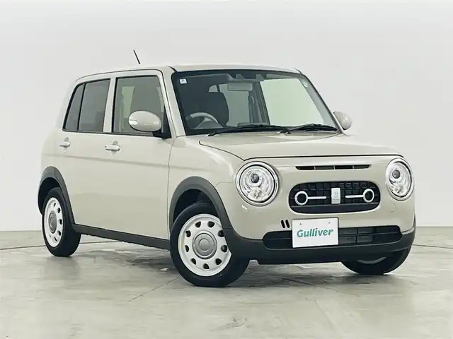 スズキ ラパン X 福島県 2024(令6)年 0.7万km フォーンベージュM 純正ディスプレイオーディオ/【USB/Bluetooth/AppleCarPlay/AndroidAuto】/・バックカメラ/衝突軽減ブレーキ/レーンキープアシスト/車線逸脱警報装置/コーナーセンサー/ハーフレザーシート/・運転席＋助手席シートヒーター/革巻きステアリング/・ステアリングスイッチ/LEDヘッドライト/・オートライト/電動格納ミラー/ABS/横滑り防止装置/盗難防止装置/社外フロアマット/プッシュスタート/・スマートキー/・スペアキー