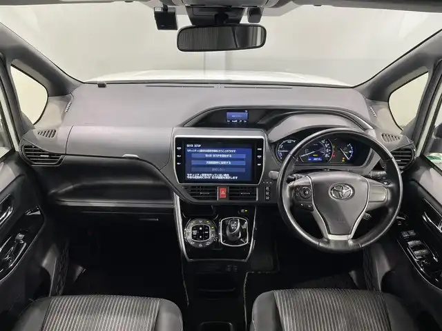 トヨタ ヴォクシー ハイブリッド ZS 煌Ⅱ 愛知県 2019(令1)年 3.9万km ホワイトパールクリスタルシャイン 純正10インチナビ/（フルセグTV／CD／DVD／Bluetooth／FM／AM）/リア天井スピーカー/純正ビルトインETC/両側電動スライドドア/シートヒーター/トヨタセーフティセンス/衝突軽減ブレーキ/クルーズコントロール/バックカメラ/コーナーセンサー/オートハイビーム/純正ドライブレコーダー/USB充電