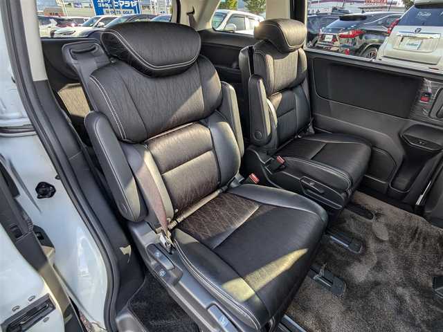 ホンダ オデッセイ アブソルート EX 大阪府 2013(平25)年 11.6万km ホワイトオーキッドパール (株)IDOMが運営する【じしゃロン東大阪店】の自社ローン専用車両になりますこちらは現金またはオートローンご利用時の価格です。自社ローンご希望の方は別途その旨お申付け下さい/全方位カメラ/純正インターナビ/フルセグテレビ/BLITZダウンサス/社外マフラー/社外20インチアルミ/BLITZ GPSレーダー/パドルシフト/前方ドライブレコーダー/両側パワースライドドア/本革巻きステアリング/二列目オットマン/ビルトインETC/クルーズコントロール/後方コーナーセンサー/運転席パワーシート/AFS/衝突被害軽減システム/横滑り防止装置/盗難防止装置/純正AW付きスタッドレスタイヤ積込/スマートキー＆プッシュスタート/取説＆保証書/スペアスマートキー